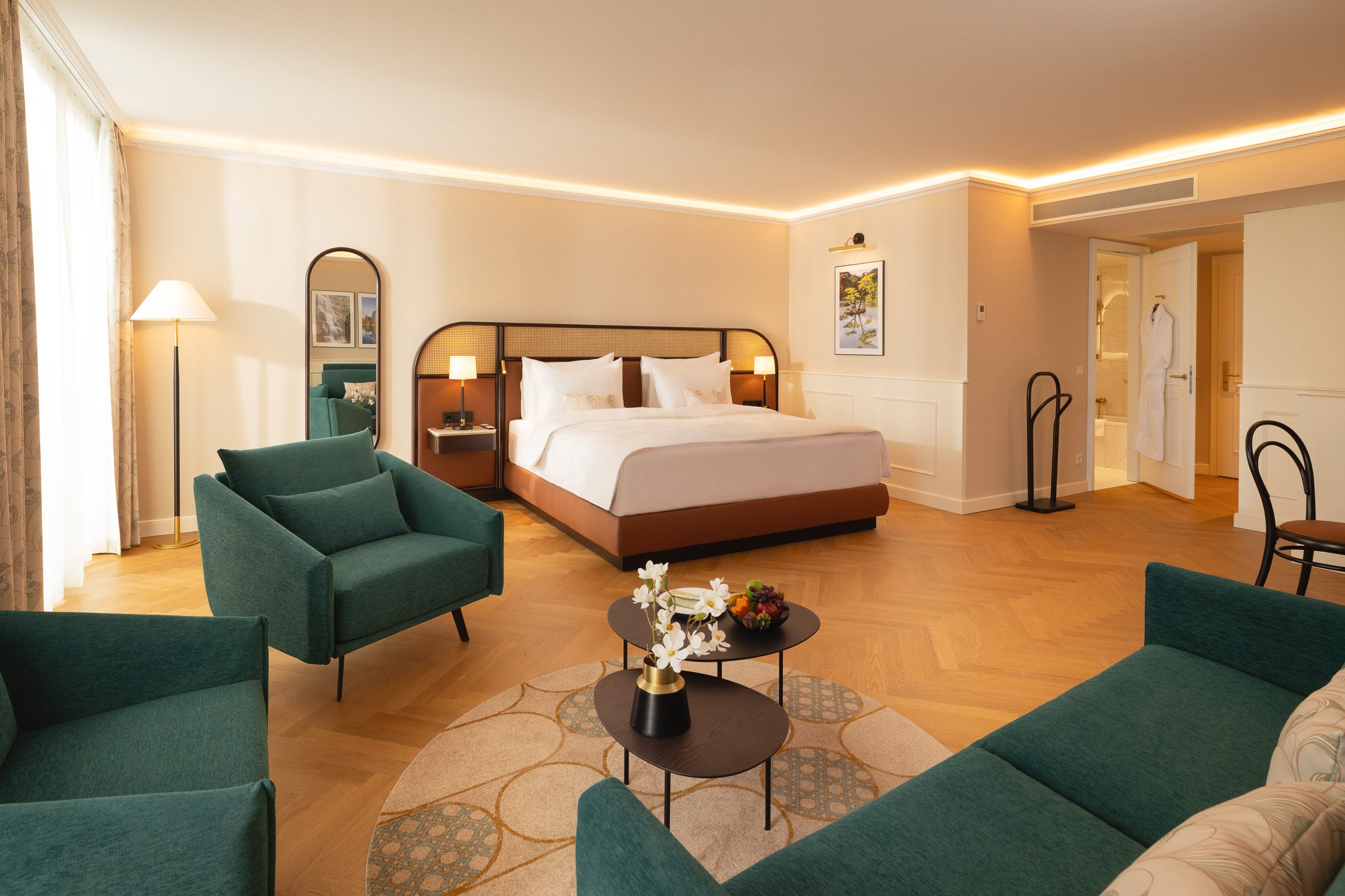 BILAflor 500 Fischgrätparkett Eiche Natur Akzent Hotel rooms at the Palais Hotel Chotek featuring elegant furnishings and oak herringbone parquet flooring