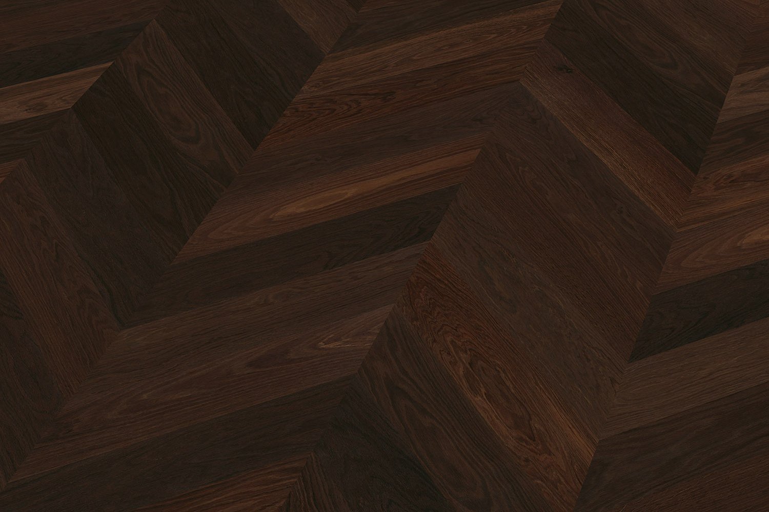 Detailed view French herringbone parquet flooring, dark smoked oak